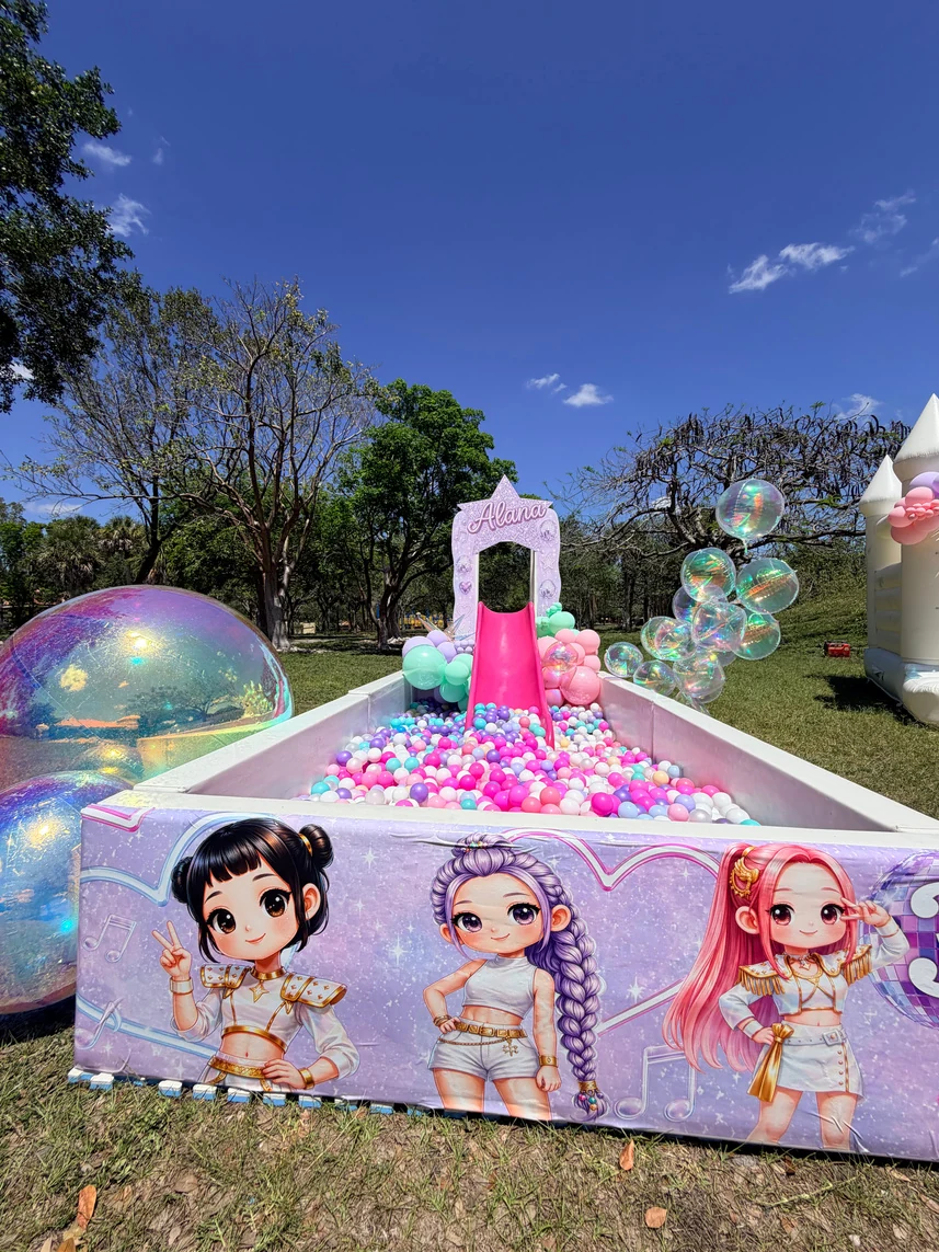 Mega luxe ball pit with white and clear balls at a toddler party